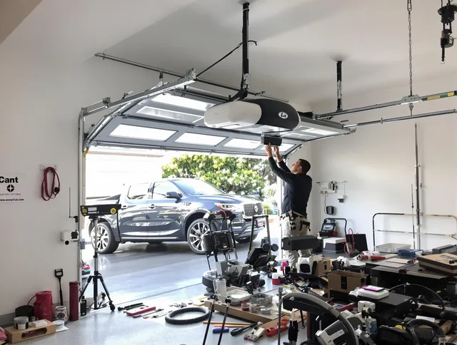 Brooklyn Garage Door Repair specialist installing smart garage door opener system in Brooklyn home