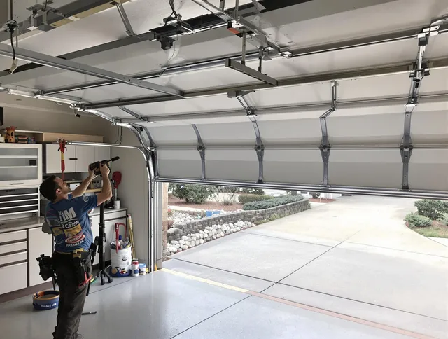 Garage door track repair service by Brooklyn Garage Door Repair in Brooklyn